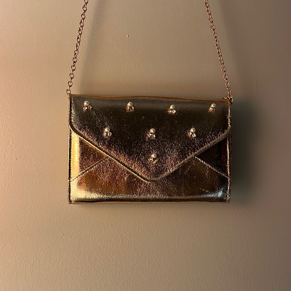Pink sparkly purse with chain